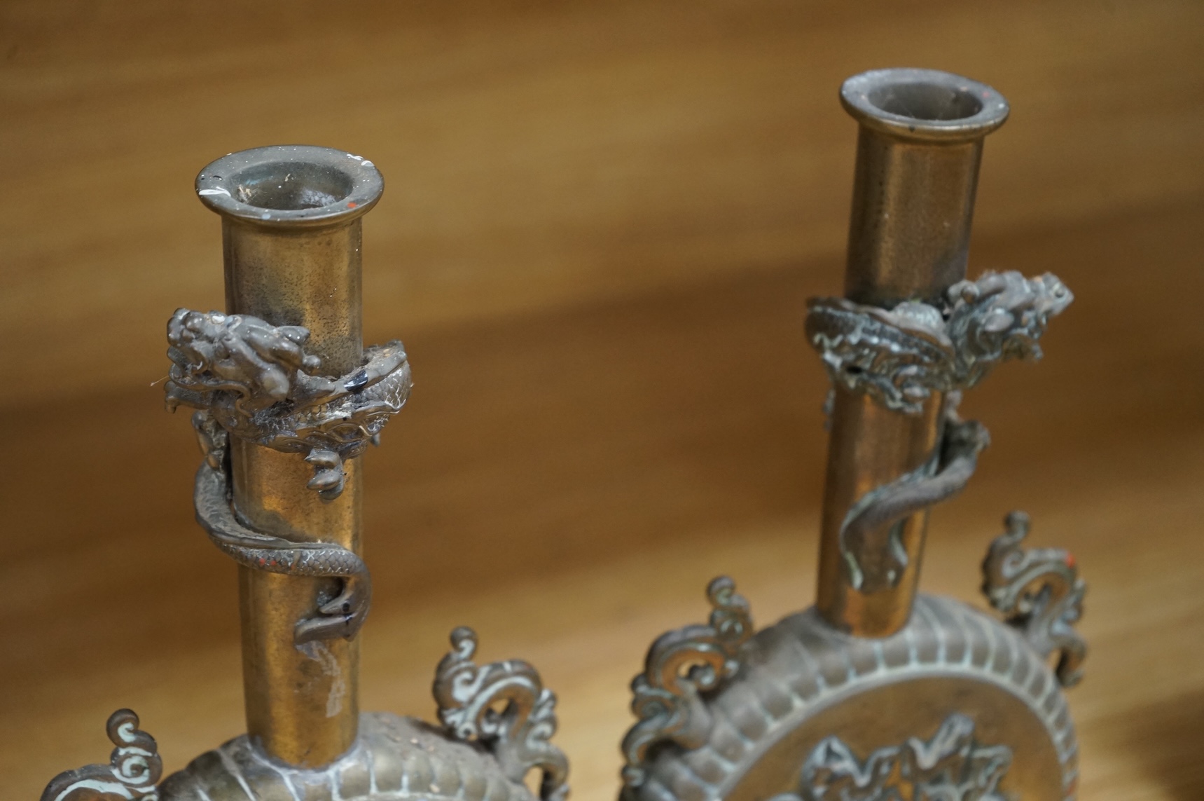A pair of 19th century Japanese bronze moonflasks, with dragon motifs, 35cm high